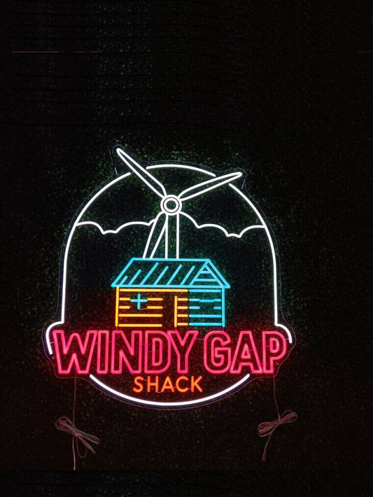 Custom LED neon sign for “Windy Gap Shack” featuring a windmill, cabin graphic and bright multicolour neon design.