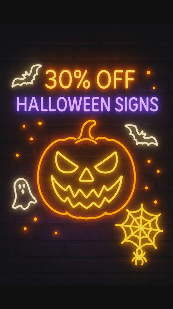 neon Halloween sign showing bold orange purple neon glow catching attention