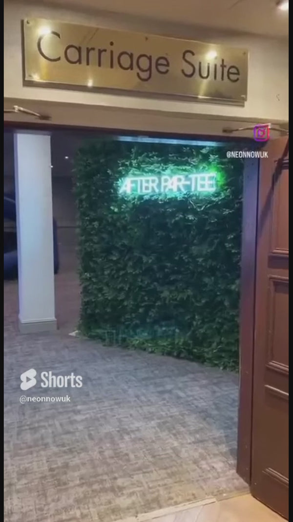 event neon sign decoration setup Kubota Osaka Japan LED neon branding installation red glow immersive event backdrop signage promotional environment